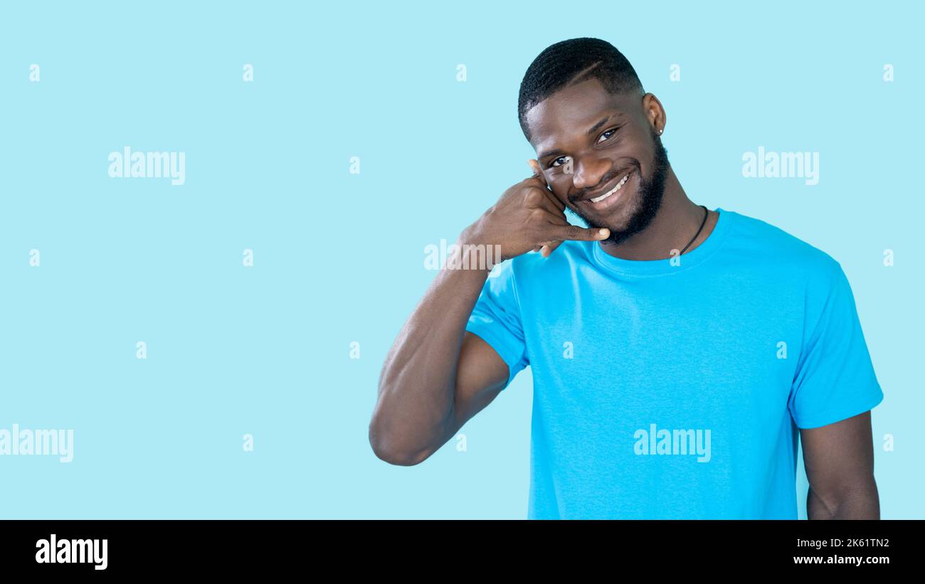 call me gesture phone contact advertising man Stock Photo - Alamy