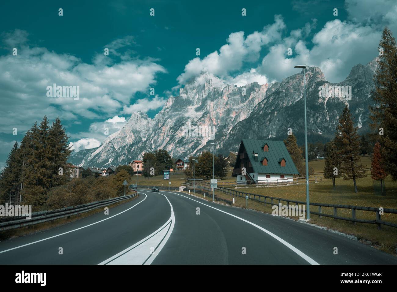 Empty road surrounded mountains hi-res stock photography and images - Alamy