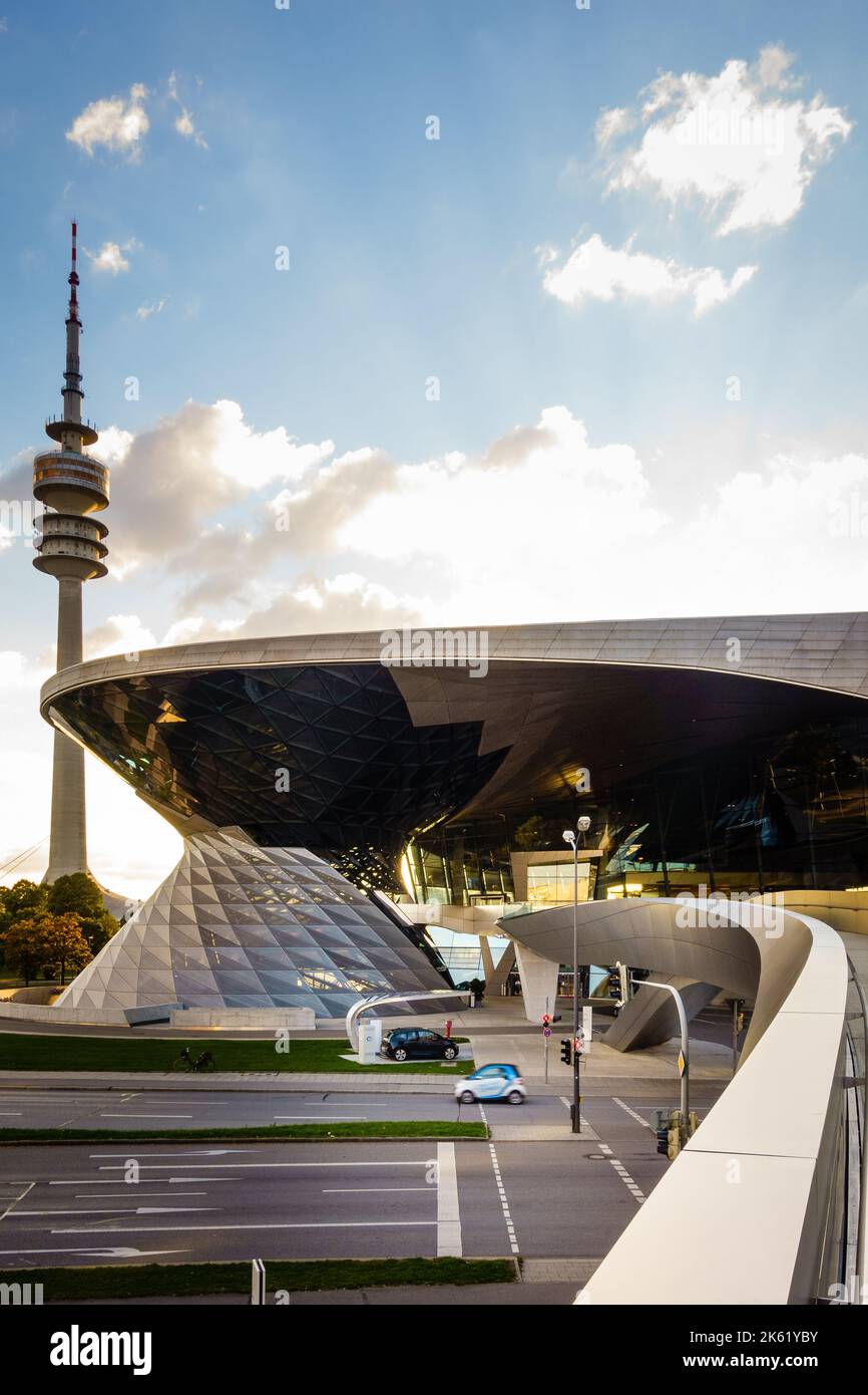 Munich, Germany, September 29, 2015: BMW showroom with Olympic television tower in the background in Munich, Germany Stock Photo