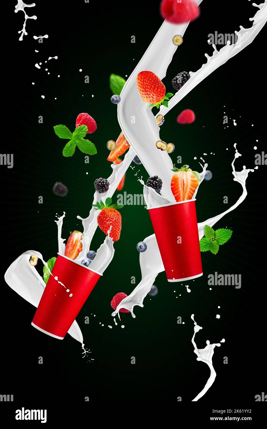 Strawberry milkshake. Paper takeaway cup with strawberry milk splashes ...