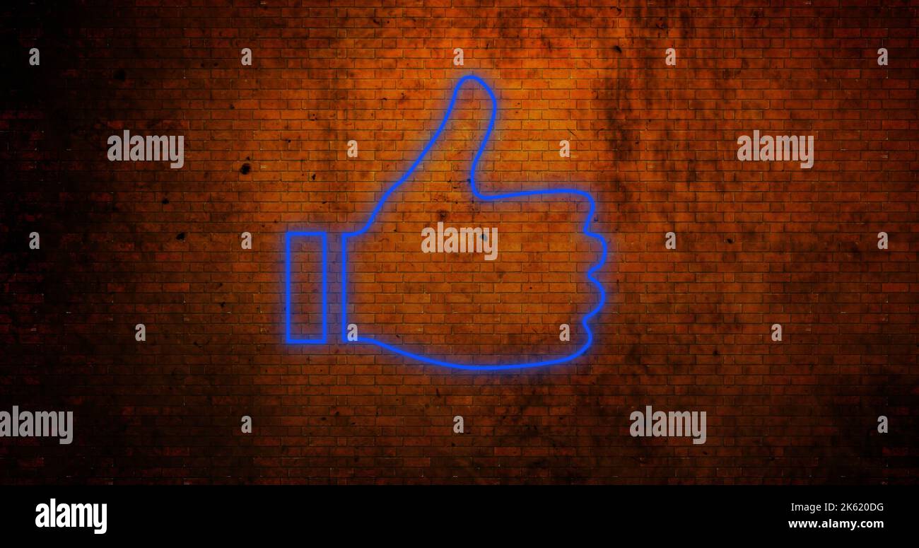 Composite of digital like button icon glowing against old brick wall ...