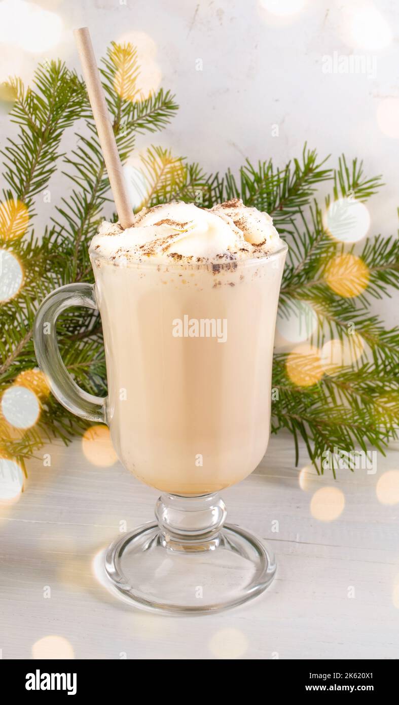 Holiday Christmas concept with traditional dairy drink with eggs eggnog ...