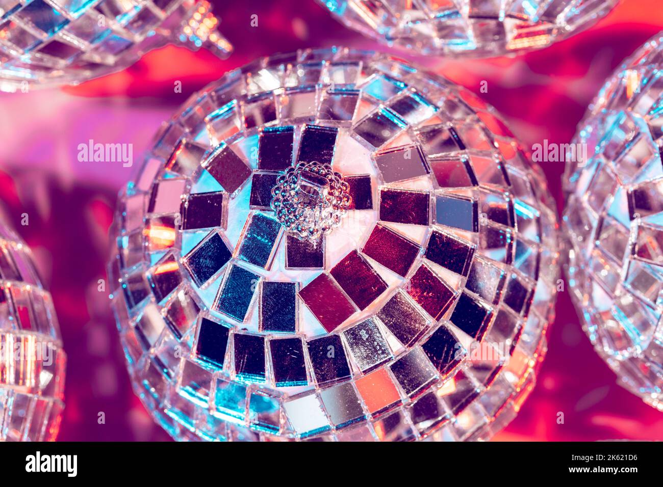 disco ball bauble on pink background. party concept Stock Photo - Alamy