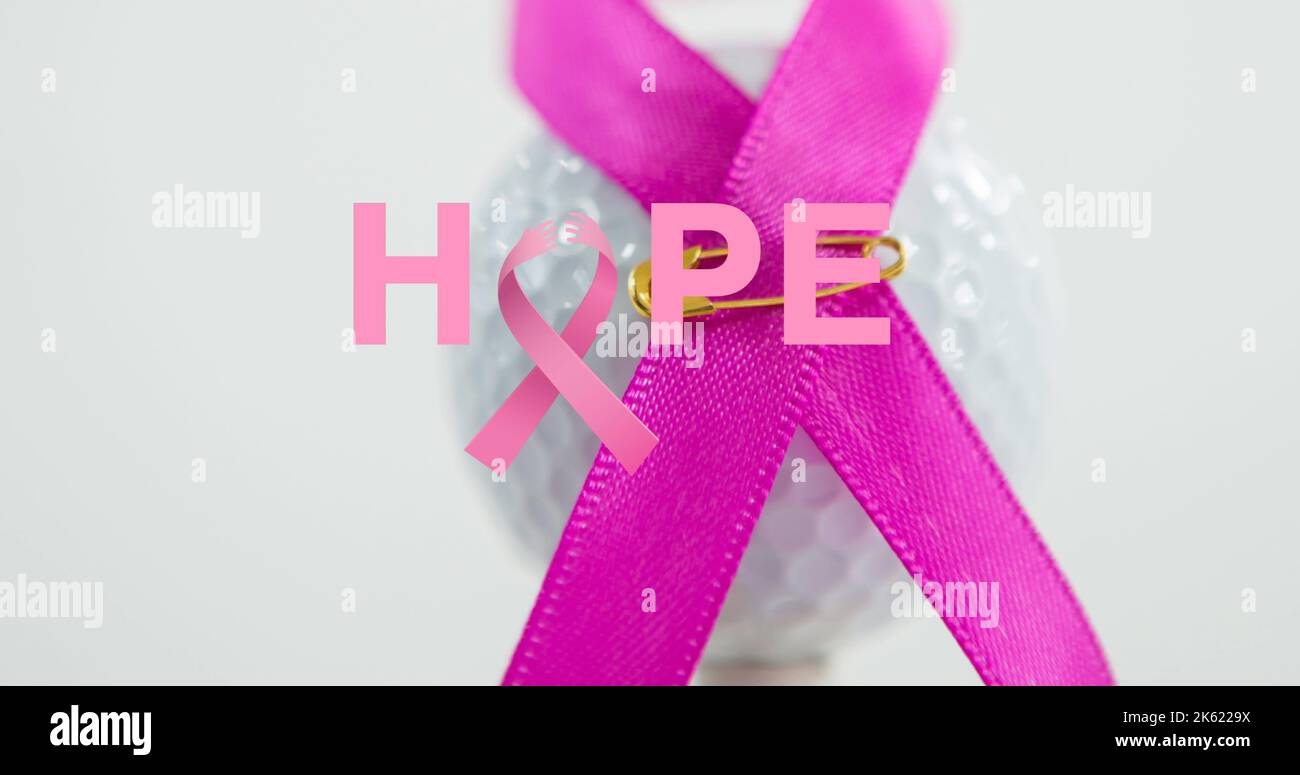 Composite of hope text with pink awareness ribbon pinned on white ball, copy space Stock Photo