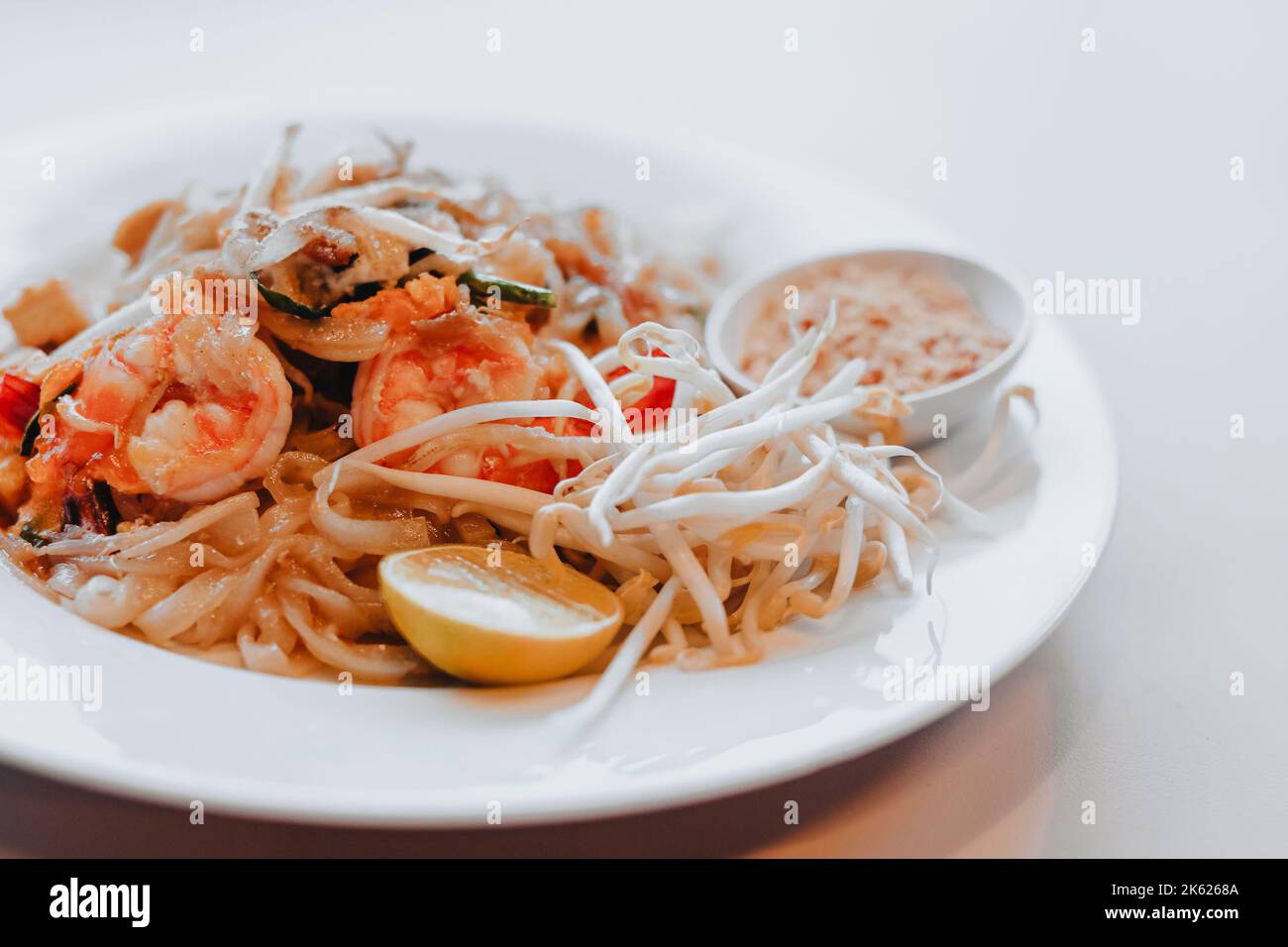 Thai traditional food Pad thai noodles with shrimp, fresh sprouts and a