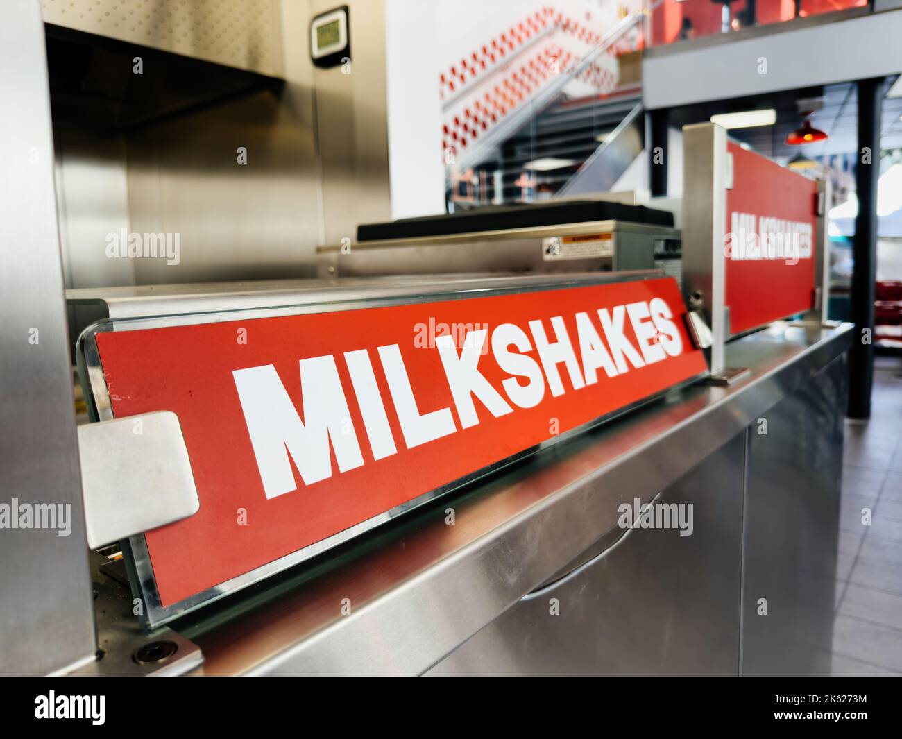 Paris, France Sep 21, 2022 Five Guys American fast food restaurant with milkshakes red word