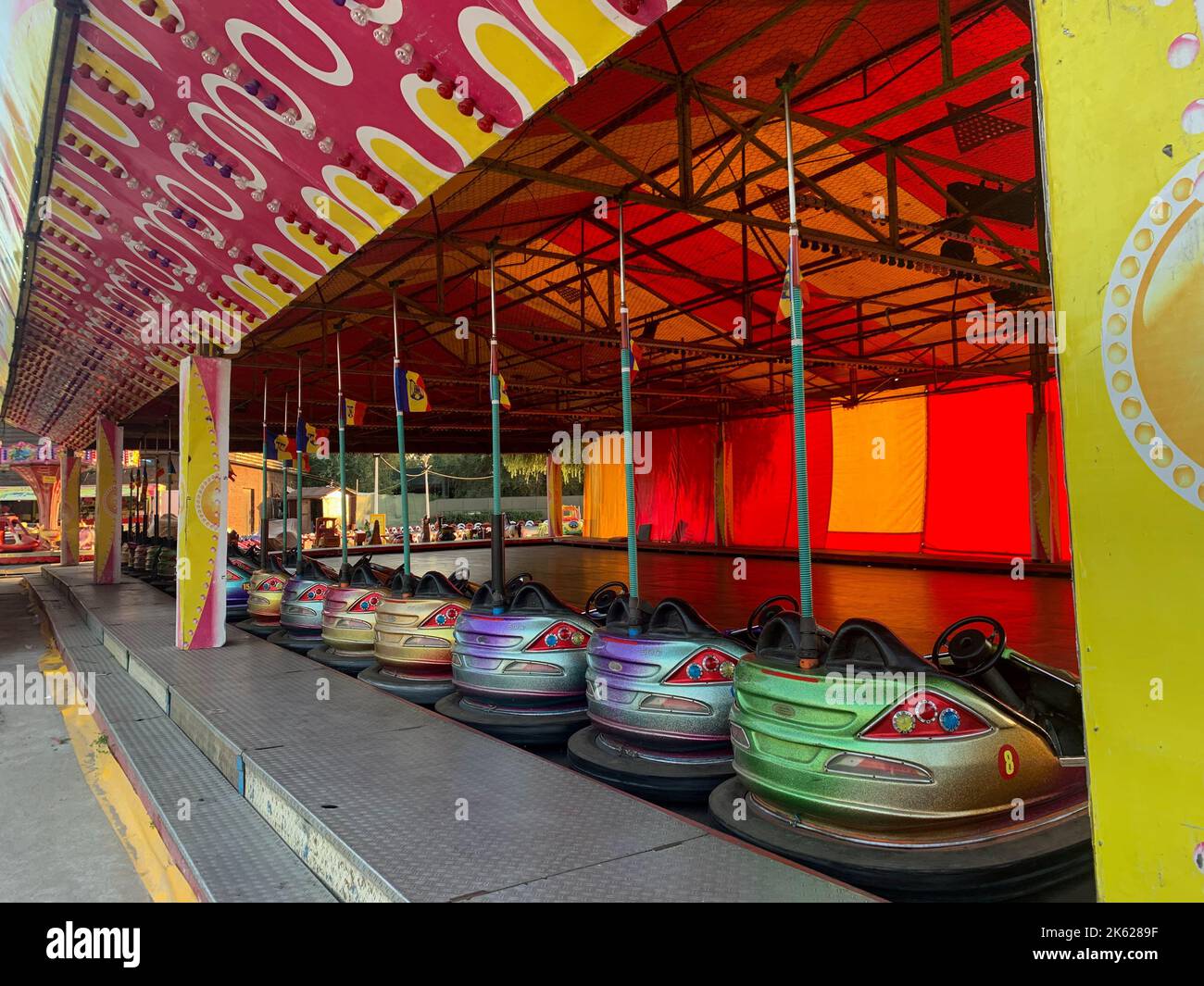 A beautiful shot of an amusement park with bumper cars in the seaside resort Jupiter, Romania