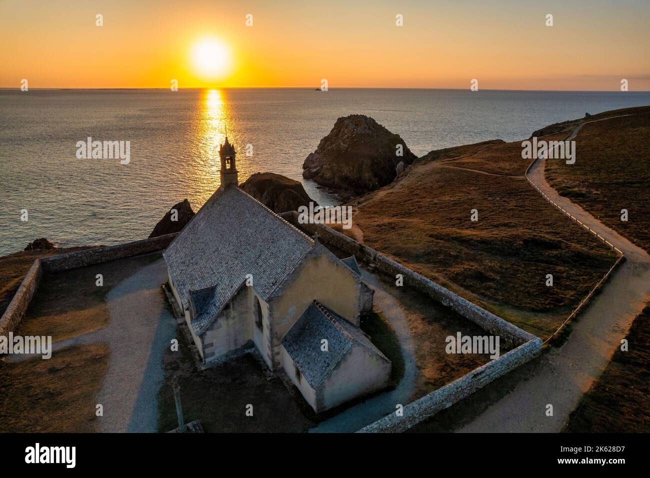 Aerial shot of the Saint They chapel at sunset, Brittany, France Stock Photo