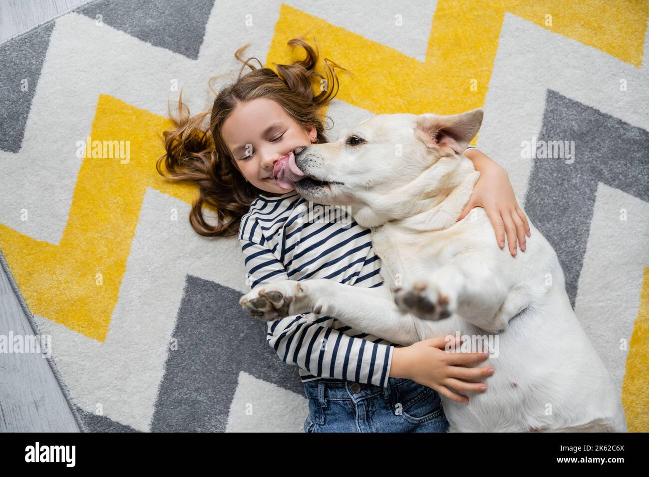 Dog licking girl face hi-res stock photography and images - Alamy