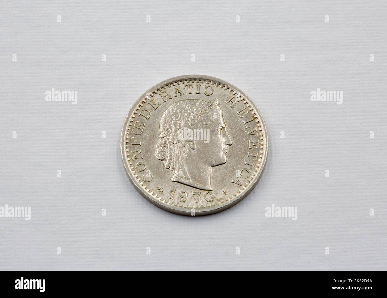 Coin of Switzerland Confoederatio Helvetica 1970 20 rappen closeup on white Stock Photo