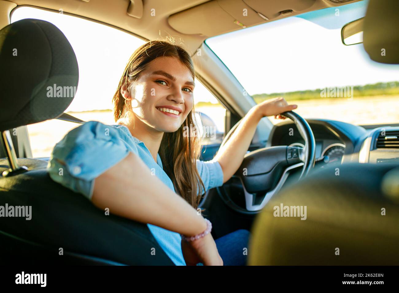 Woman in blue shirt hi-res stock photography and images - Alamy