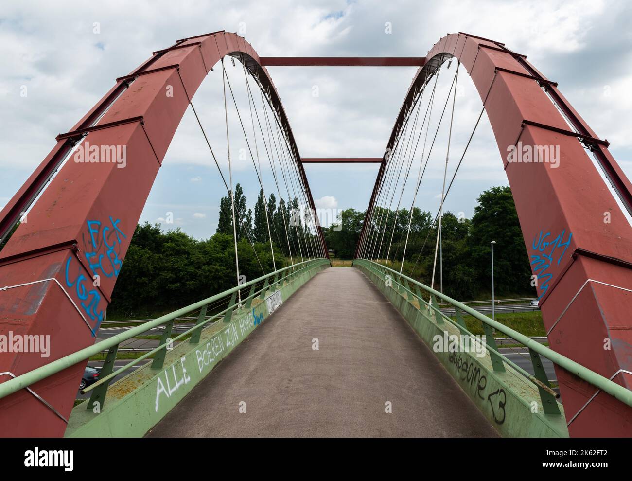 Wetteren, East Flanders , Belgium - 07 16 2021 - Pedestrian and bicycle bridge over the E40 highway Stock Photo