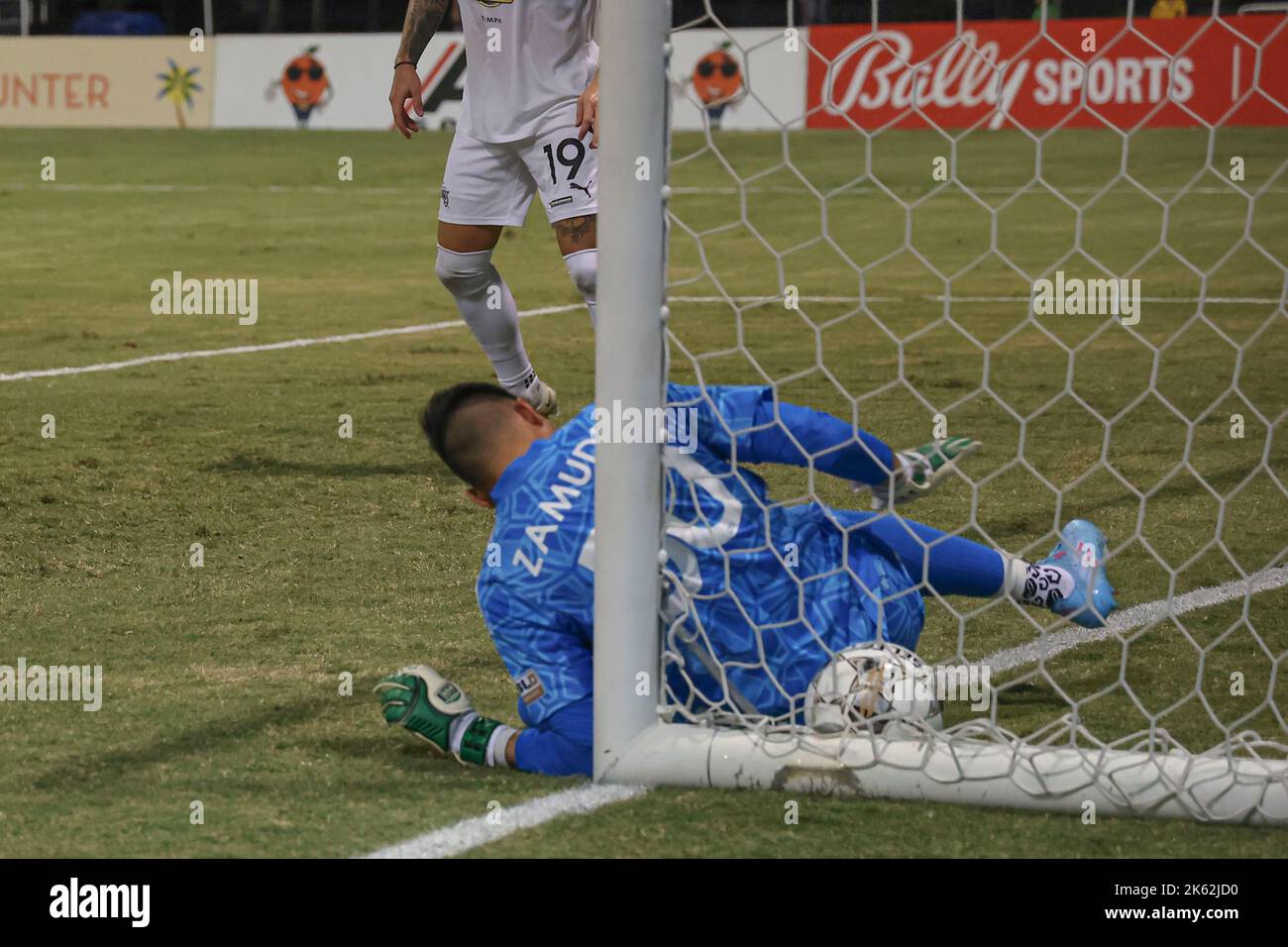 St. Petersburg, FL: Loudon United FC goalkeeper Luis Zamudio (50) is unable to stop by Tampa Bay Rowdies forward Jake LaCava (19)  who scored the four Stock Photo