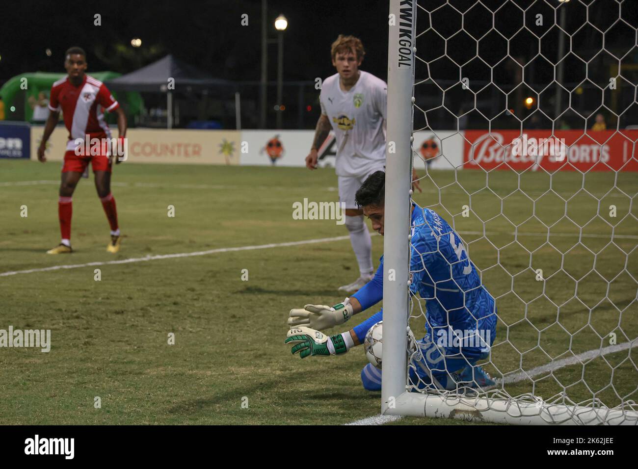 St. Petersburg, FL: Loudon United FC goalkeeper Luis Zamudio (50) is unable to stop by Tampa Bay Rowdies forward Jake LaCava (19)  who scored the four Stock Photo