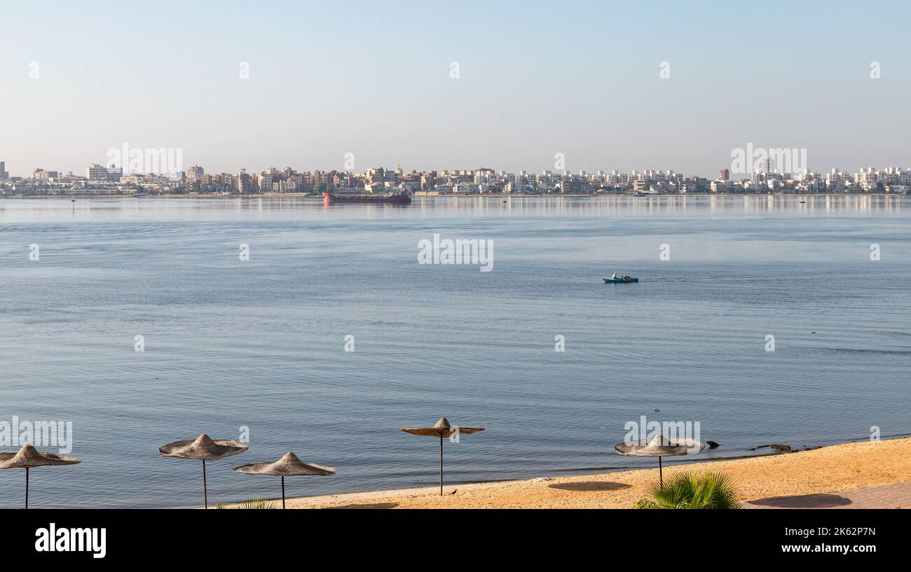 Lake Timsah, coastal view on a sunny morning. This is one of the Bitter Lakes linked by the Suez Canal. Ismailia, Egypt Stock Photo