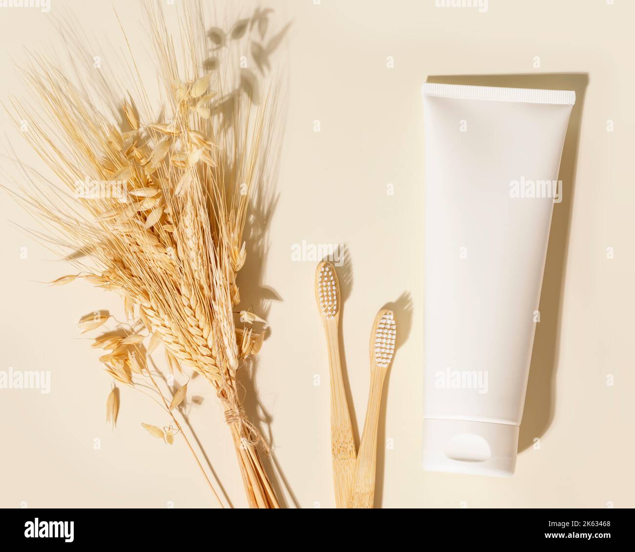 Wheat Toothpaste White tube of toothpaste, wooden toothbrushes bouquet of rye and wheat ...