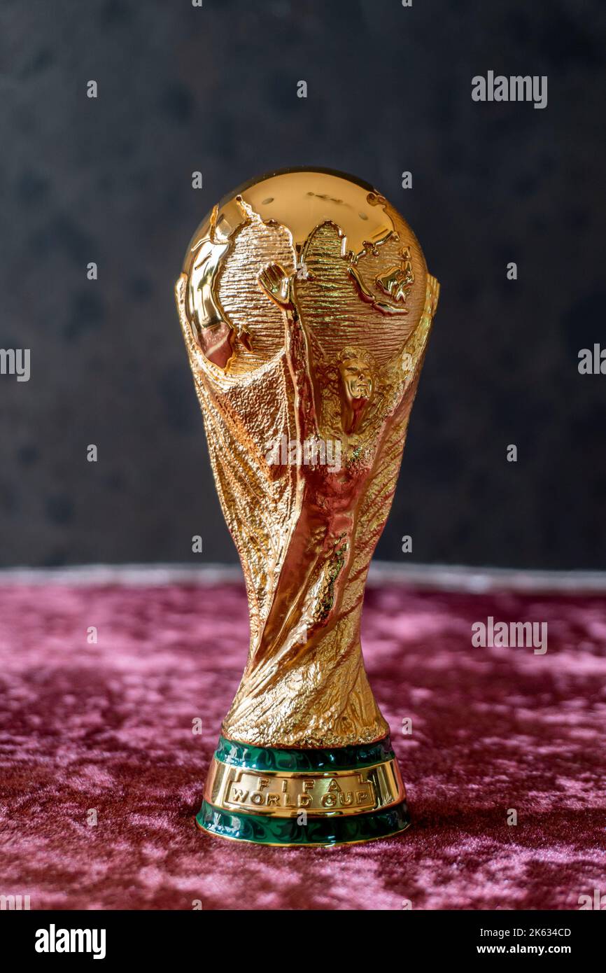 FIFA World Cup Trophy isolated against black background. Stock Photo