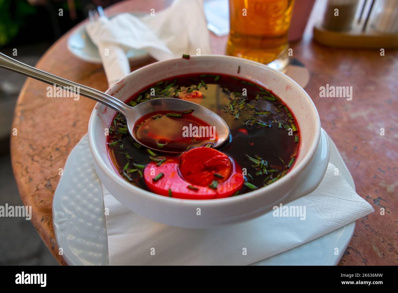 Bowl of red borscht, outdoor café, Kraków, Poland Stock Photo