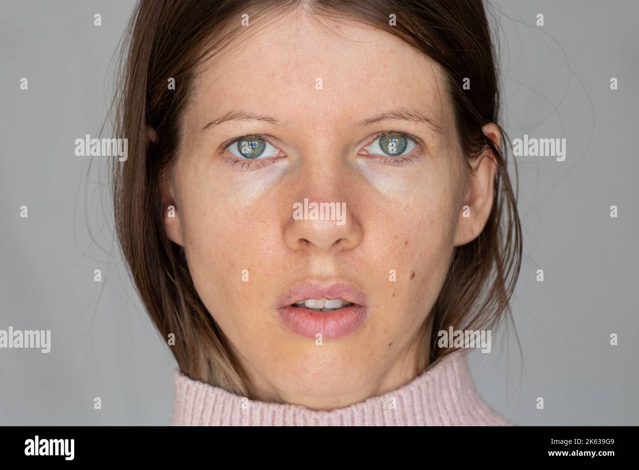 The face of a young Ukrainian girl without retouching, close-up Stock Photo