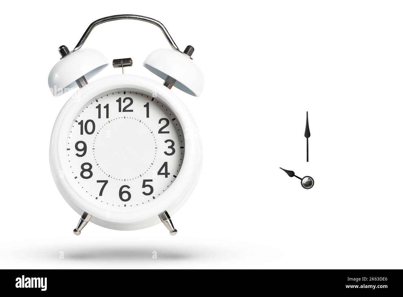 Alarm clock without arrows. White classic alarm clock on a white background without arrows, space to insert text or copy. Arrow set for alarm clock Stock Photo