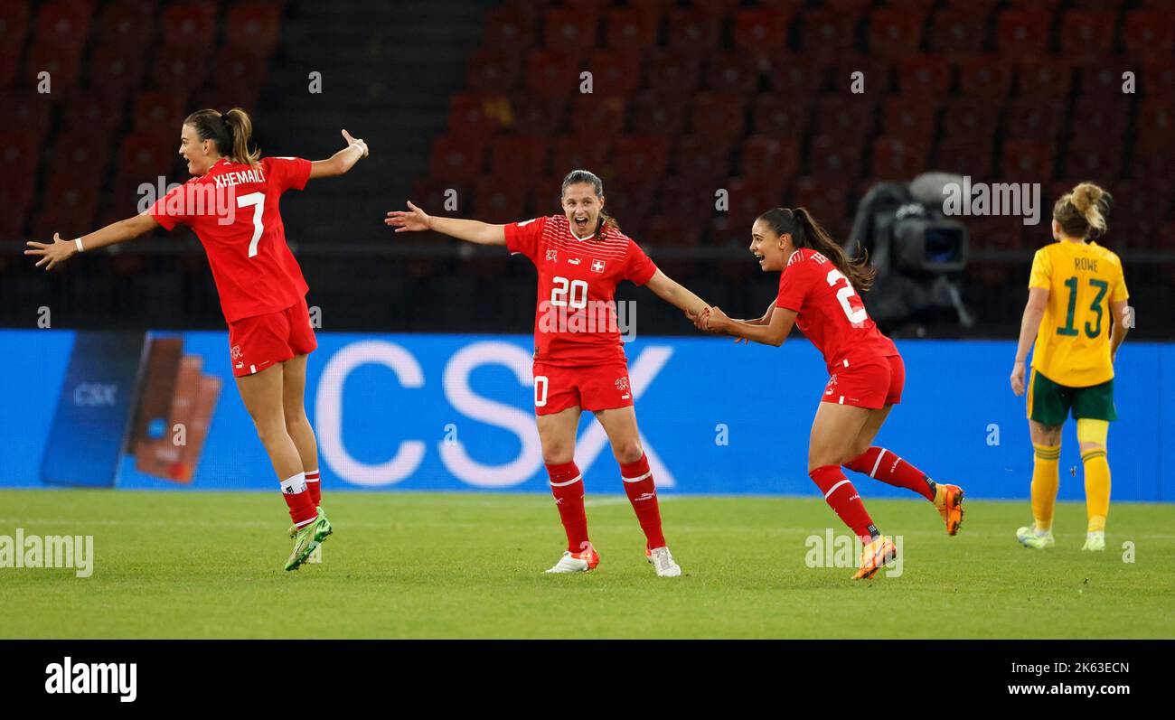 Soccer Football - FIFA Women's World Cup - UEFA Qualifiers - Switzerland v Wales - Stadion Letzigrund, Zurich, Switzerland - October 11, 2022 Switzerland's Riola Xhemaili, Fabienne Humm and Meriame Terchoun celebrate winning the match to qualify for the 2023 FIFA Women's World Cup REUTERS/Stefan Wermuth Stock Photo