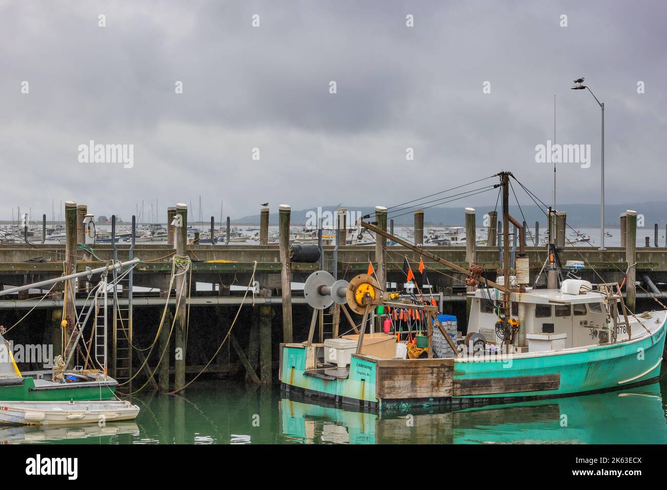 Plymouth, Massachusetts, USA - September 12, 2022: Fishing boats docked in Plymouth Harbor in Cape Bay. Stock Photo