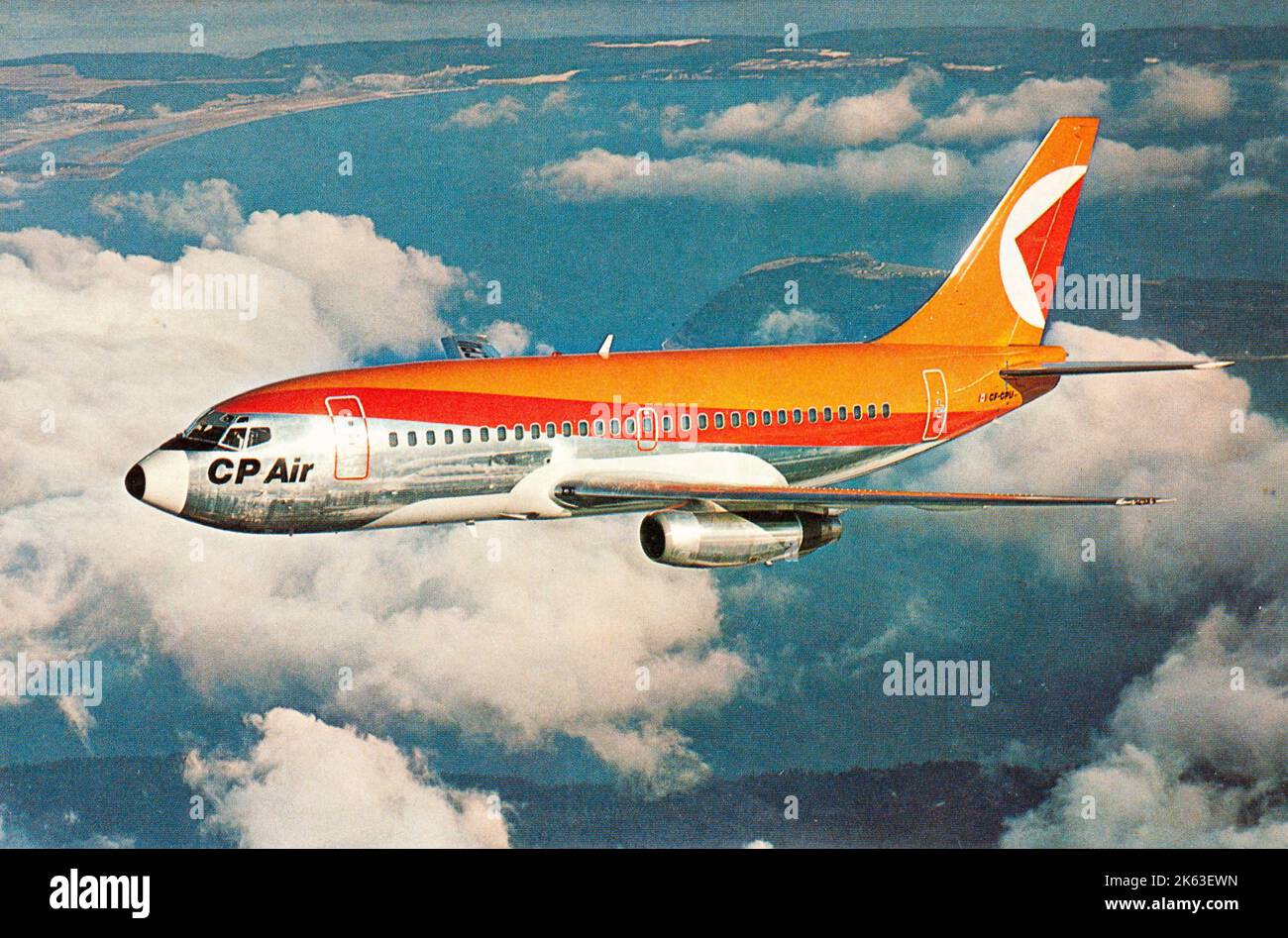 Former Canadian Pacific Airways Boeing 737 200 flying over Canadian territory in early seventies Stock Photo