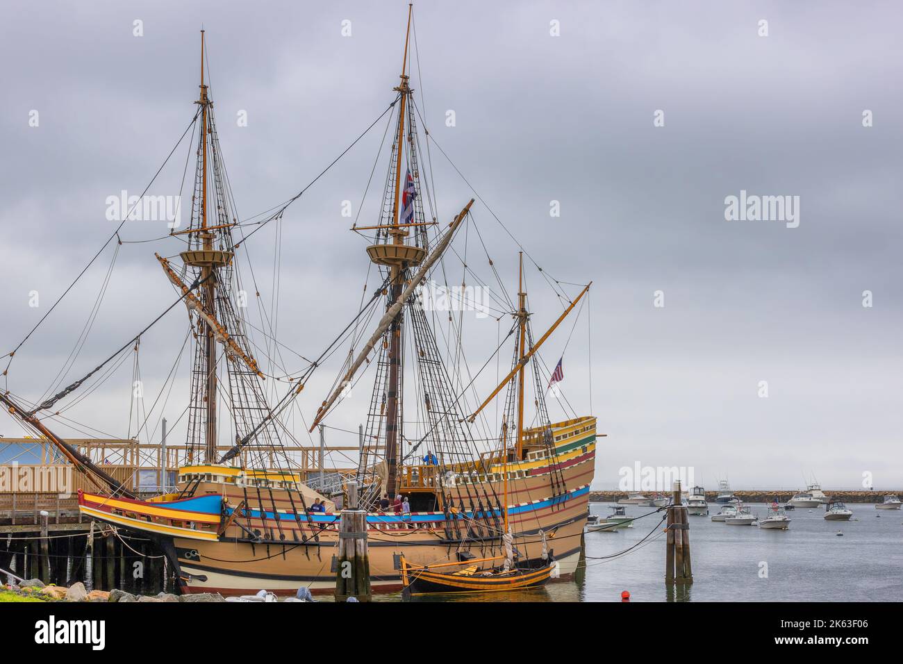 Plymouth, Massachusetts, USA - September 12, 2022: Mayflower II at it's dock seen from the waterfront park at Plymouth Harbor on Cape Bay. Stock Photo