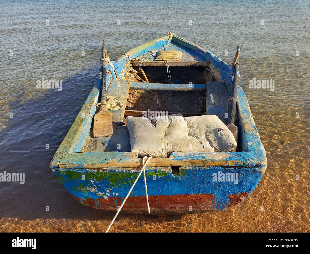 Old wooden boat of fishermen on the beach in Dahab, Sinai, Egypt Stock ...