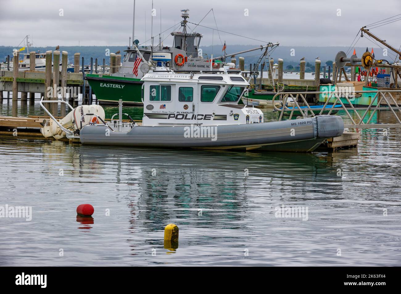 Plymouth, Massachusetts, USA - September 12, 2022: Harbor police boat dock on Cape Bay at Plymouth Harbor Stock Photo
