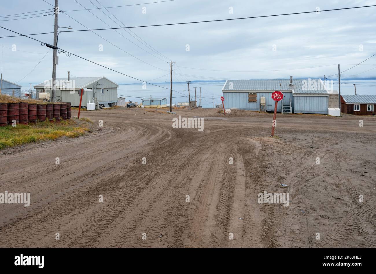 Streetscape of houses overlooking the Arctic Ocean at Pond Inlet