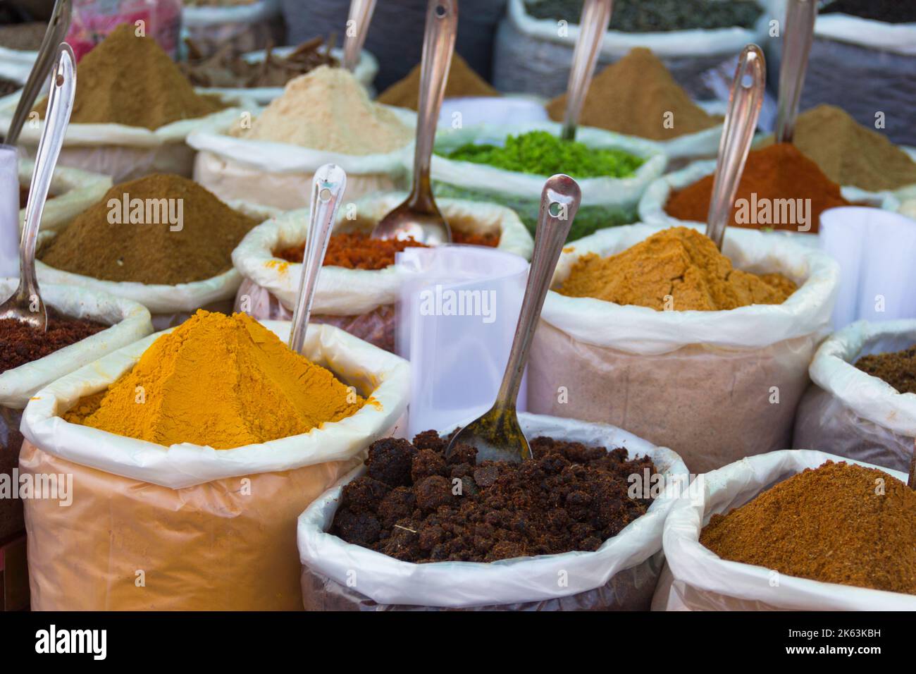 Indian food spices in Anjuna Market, Goa. Traditional culinary ingredients of India Stock Photo