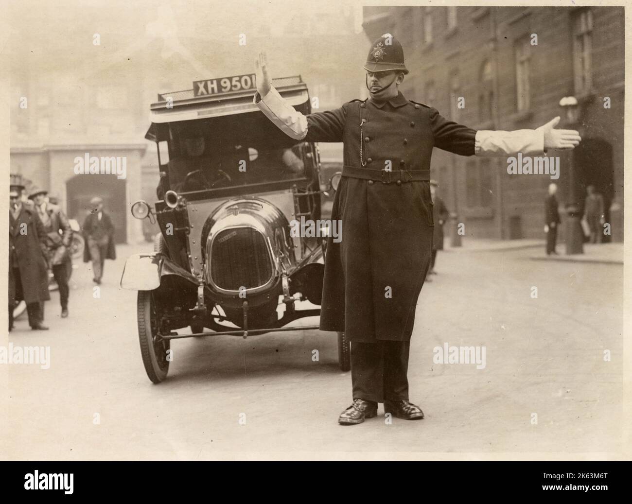 Traffic Policeman directing the traffic at Parliament Street, London. Stock Photo