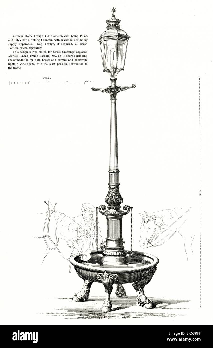 Decorative cast iron electric lamp pillar with drinking fountain for horses and driver, dog trough optional. Stock Photo