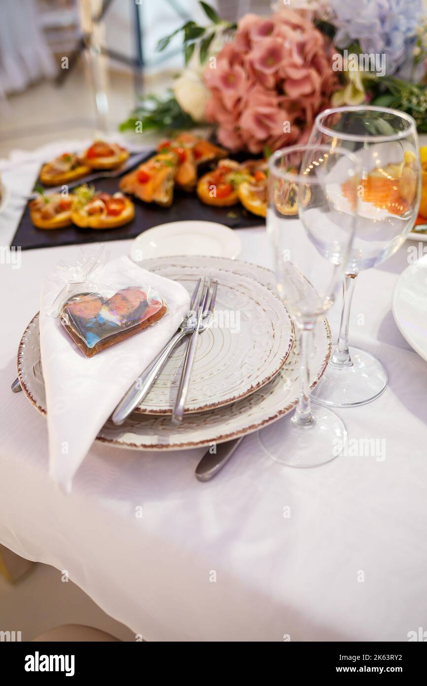 Wedding table for newlyweds with beautiful decorations Stock Photo