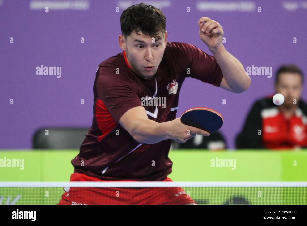 Ross WILSON of England (pictured) v Joshua STACEY of Wales in the Men's Singles Classes 8-10 - Semi-Final table tennis at the 2022 Commonwealth games in the NEC, Birmingham. Stock Photo