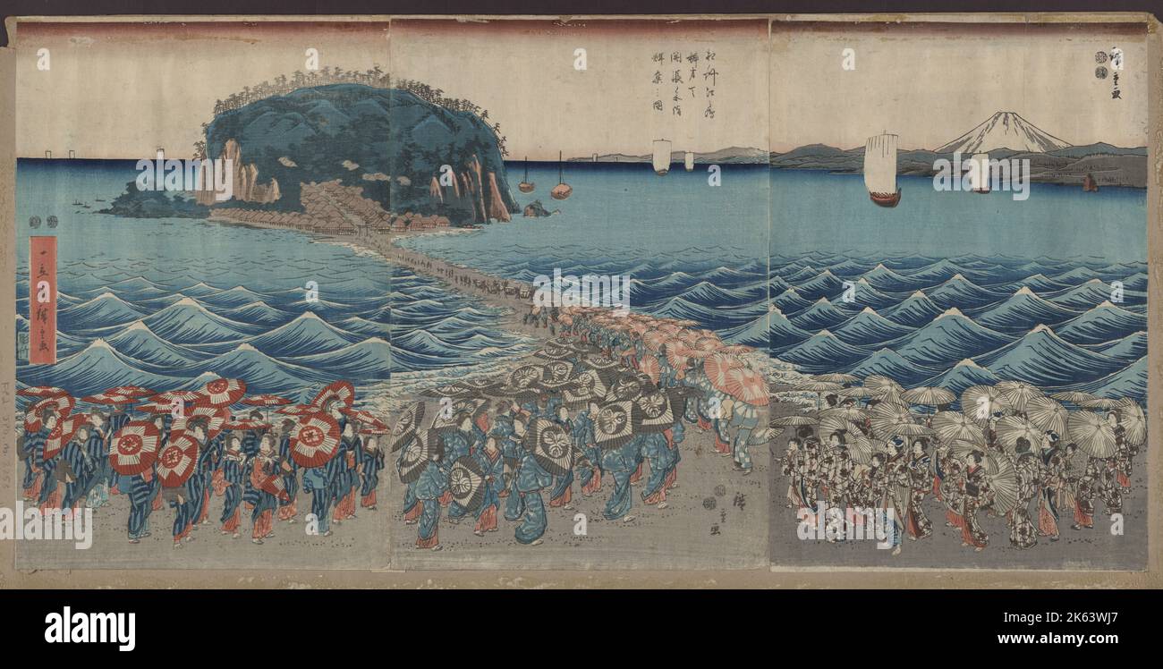 Crowd visiting Buddihist image exhibition at Enoshima Benzaiten Shrine in Sagami Province. Japanese triptych print shows large groups of women pilgrims visiting Enoshima shrine to worship an image of Benzaiten, the Goddess of Good Fortune. They are walking towards an island on a causeway with sailboats and Mount Fuji in the background. Date between 1847 and 1850. Stock Photo
