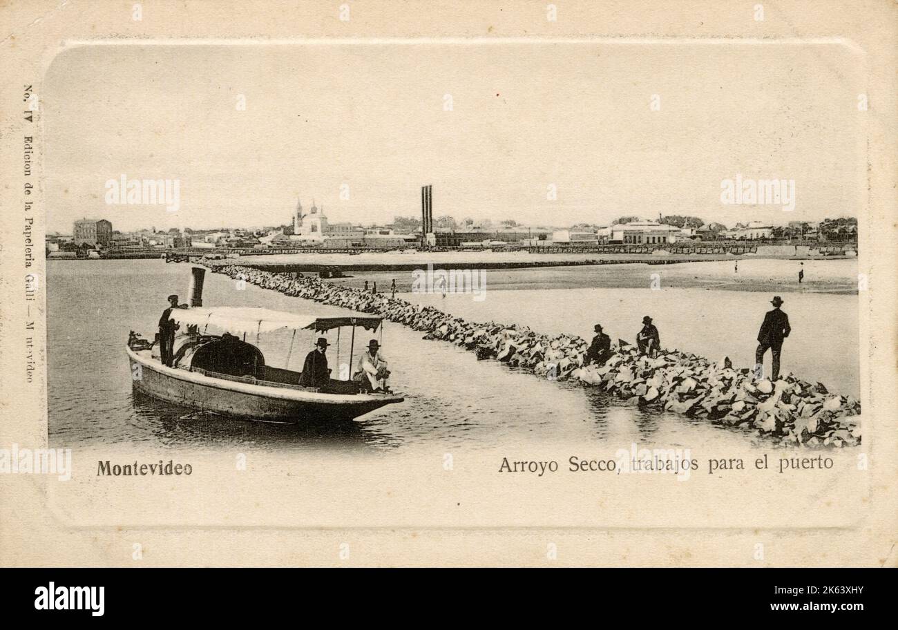 Montevideo, Uruguay - Arroyo Secco - Harbour wall. Note the lovely steam launch.     Date: circa 1905 Stock Photo