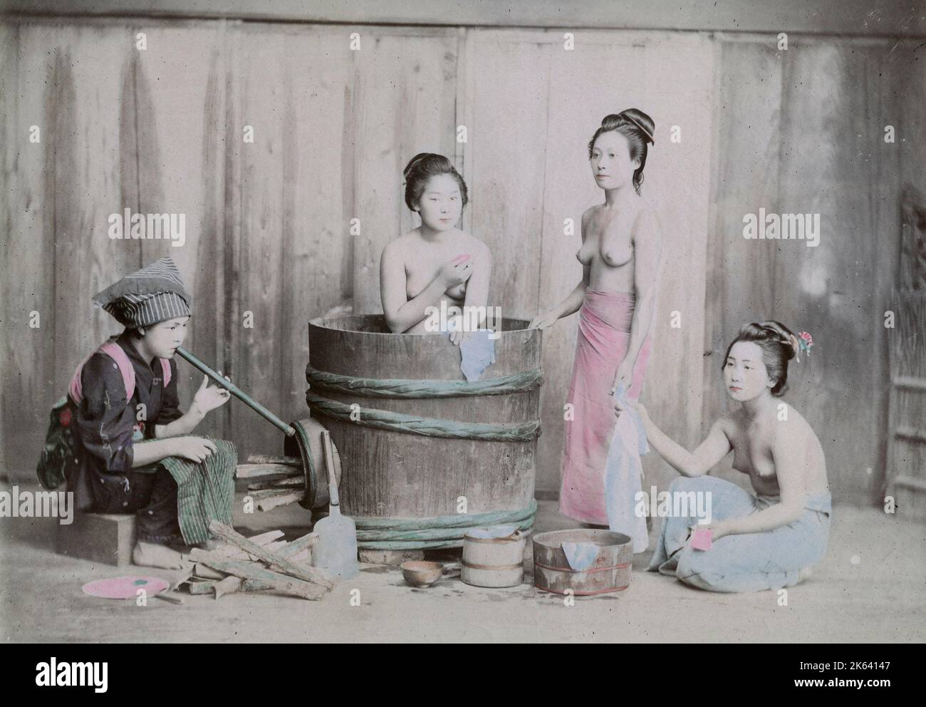 Young women taking a bath at home, late 19th century Japan. Vintage 19th century photograph. Stock Photo