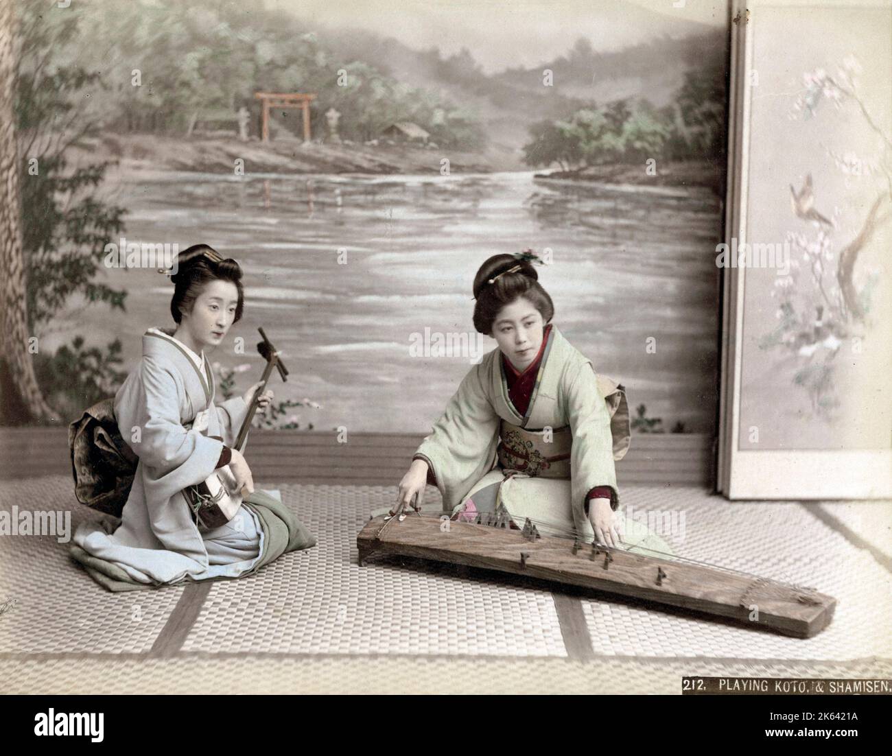 c.1880s Japan - geishas playing the shamisen and koto musical instruments Stock Photo