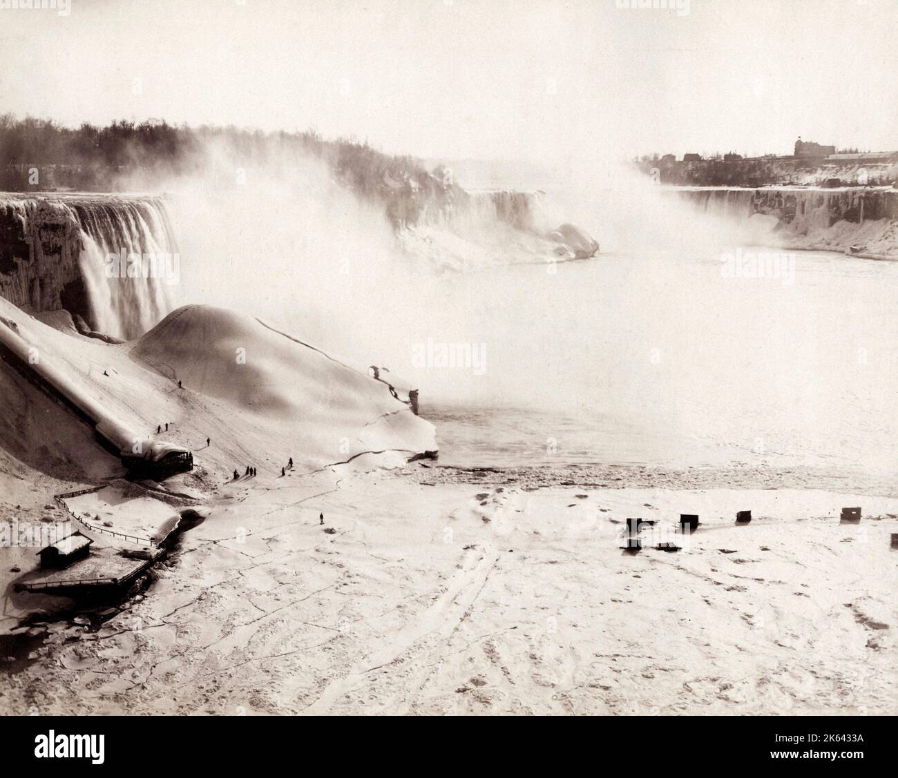 19th century vintage photograph: Niagara Falls frozen in Winter, USA, Canada border. Stock Photo