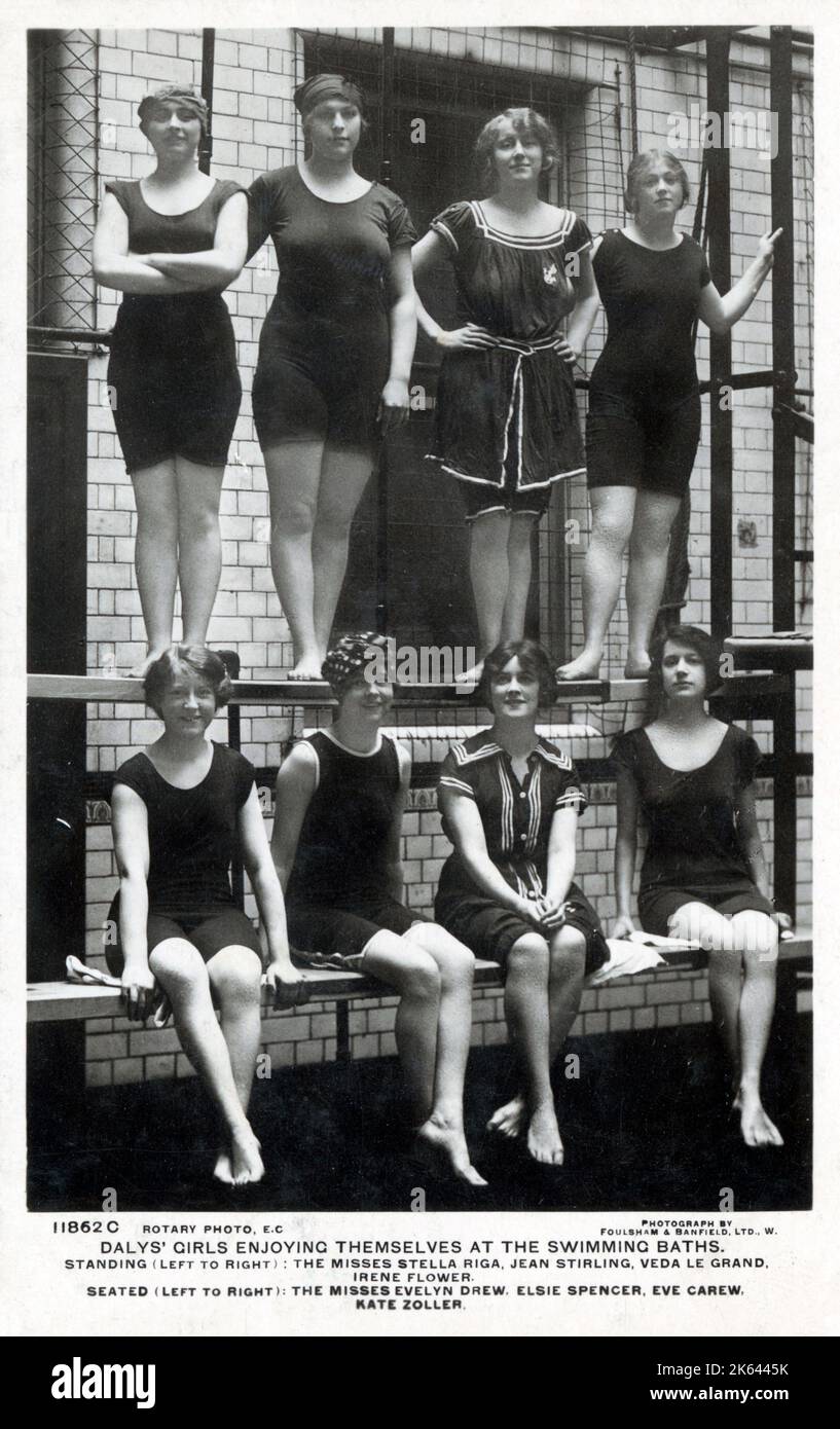 Daly's Girls enjoying themselves at the swimming baths. Standing (left to right): The Misses Stella Riga, Jean Stirling, Veda Le Grand and Irene Flower. Seated (left to right): The Misses Evelyn Drew, Elsie Spencer, Eve Carew and Kate Zoller. Daly's Theatre was located at 2 Cranbourn Street, just off Leicester Square. Between 1895 and 1915 the British producer George Edwardes ran the house, where he presented a series of long-running musical comedies     Date: circa 1910 Stock Photo