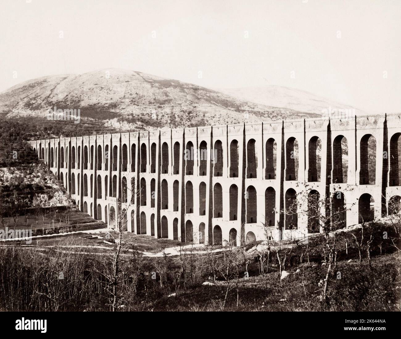 Vintage 19th century photograph: The Aqueduct of Vanvitelli or Caroline Aqueduct is an aqueduct built to supply the Reggia di Caserta and the San Leucio complex, supplied by water arising at the foot of Taburno, from the springs of the Fizzo, in the territory of Bucciano, which it carries along a winding 38 km route, Italy. Stock Photo