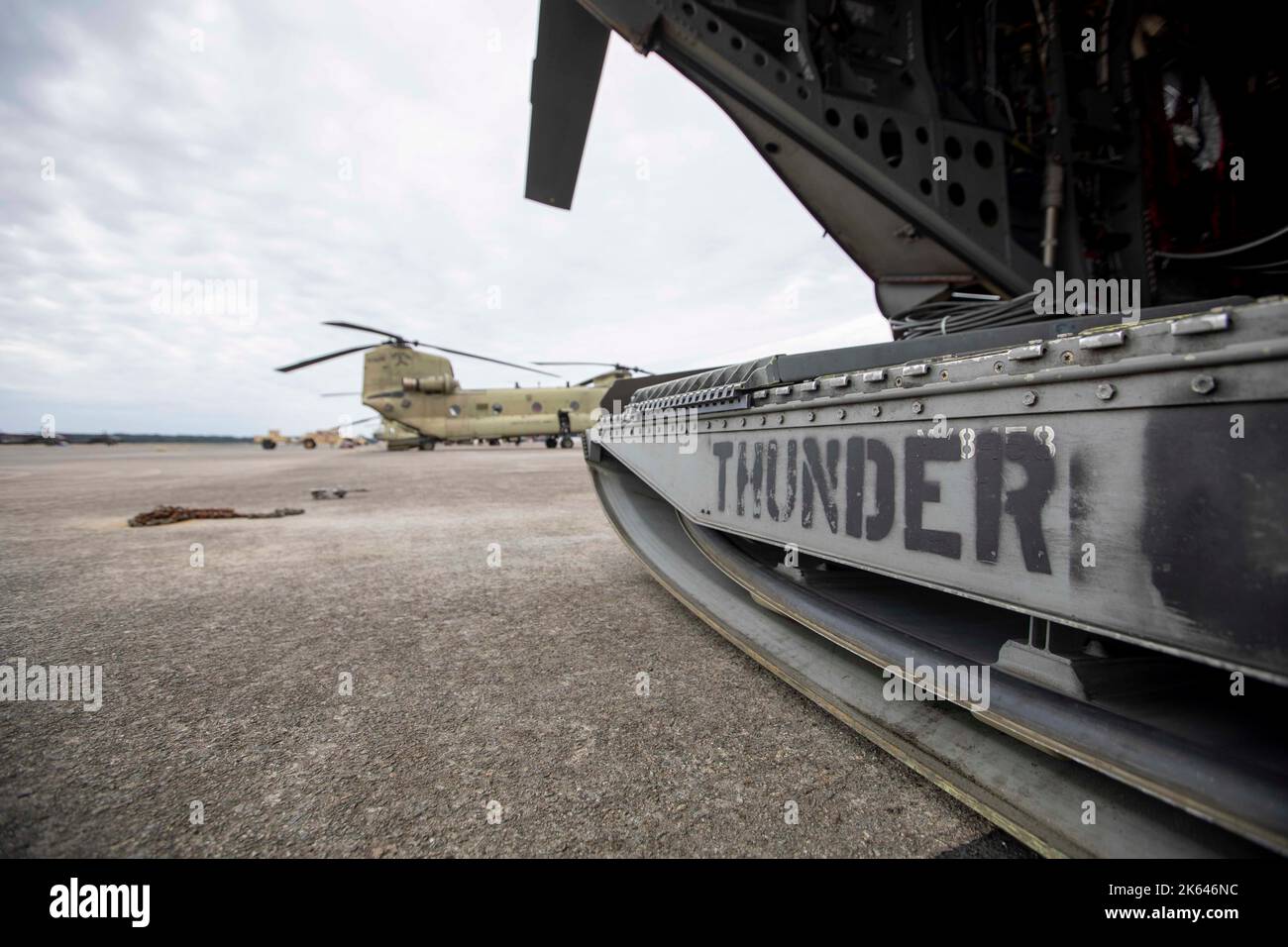 A CH-47 Chinook sits on the flightline at Hunter Army Airfield, Georgia, prior to being evacuated for Hurricane Ian on September 28, 2022. Evacuating some aircraft to Fort Benning, Georgia and hangaring the rest of the fleet allowed the brigade to maintain readiness while keeping Soldiers and equipment safe but able to spring into action for follow-on missions if needed. (U.S. Army photo by Sgt. Savannah Roy / 3rd Combat Aviation Brigade, 3rd Infantry Division) Stock Photo