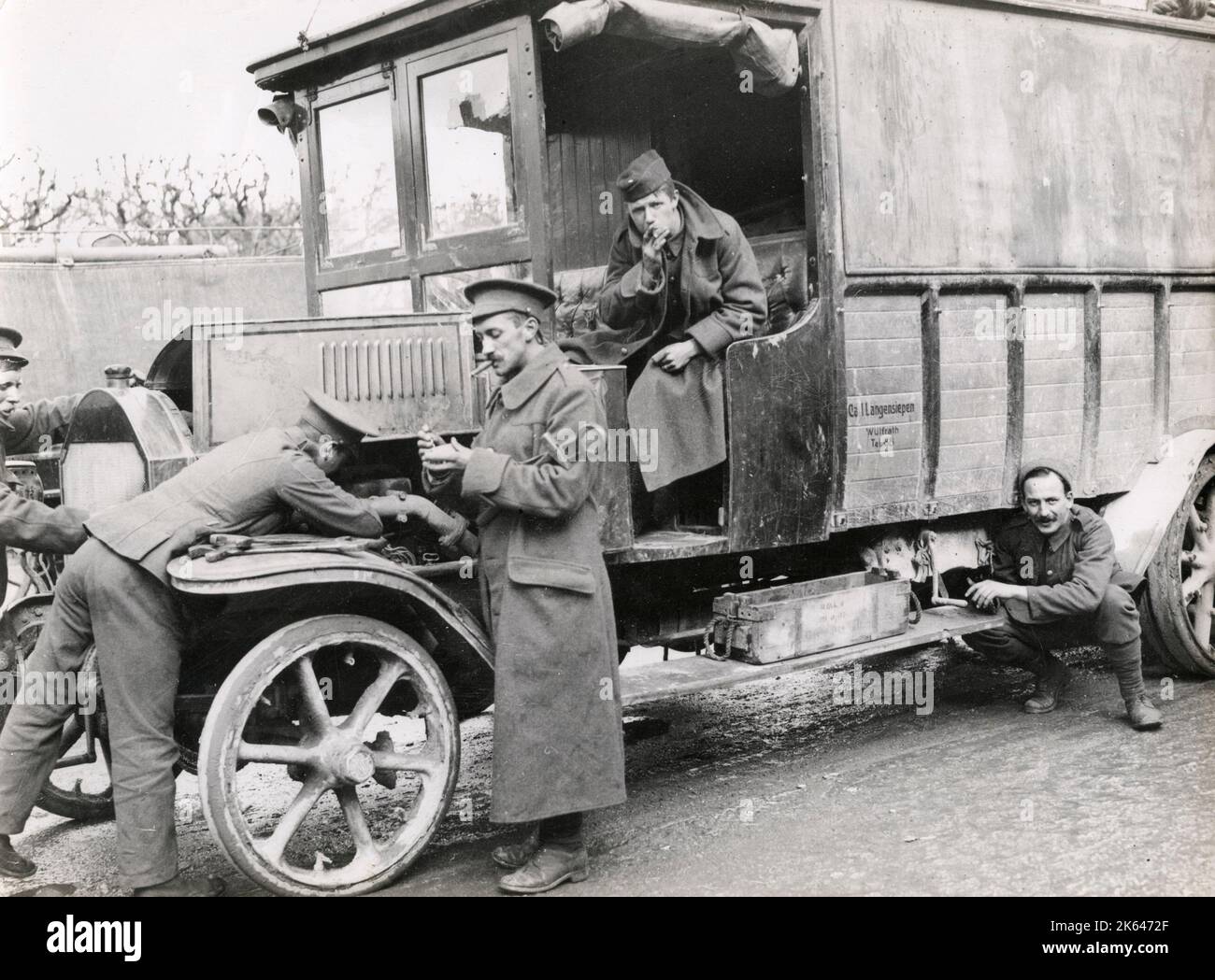 Vintage World War One photograph - WWI: British soldiers with captured German vehicle Stock Photo