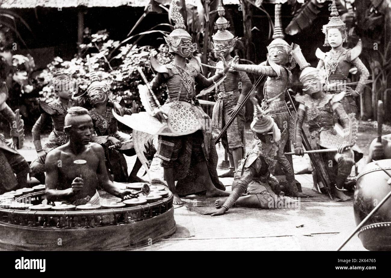 c.1880 South East Asia - Dutch East Indies, Java, Indonesia, dance group with musicians - Topeng mask Stock Photo