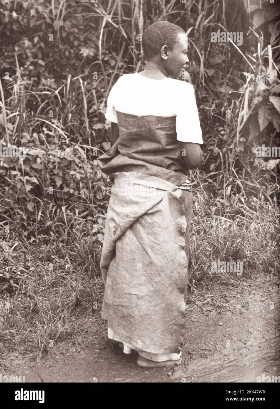 1940s East Africa - Uganda - Baganda woman in a traditional bark cloth or barkcloth dress Photograph by a British army recruitment officer stationed in East Africa and the Middle East during World War II Stock Photo