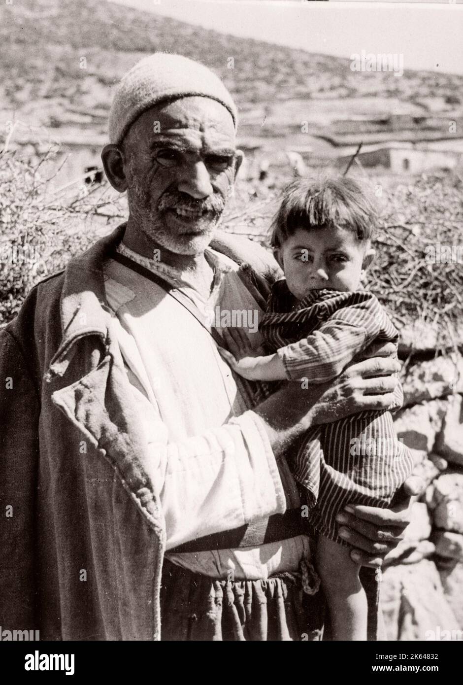 1943 Syria - British military office treats Kurdish people along the Syria Turkey border - many suffering from Trachoma Photograph by a British army recruitment officer stationed in East Africa and the Middle East during World War II Stock Photo