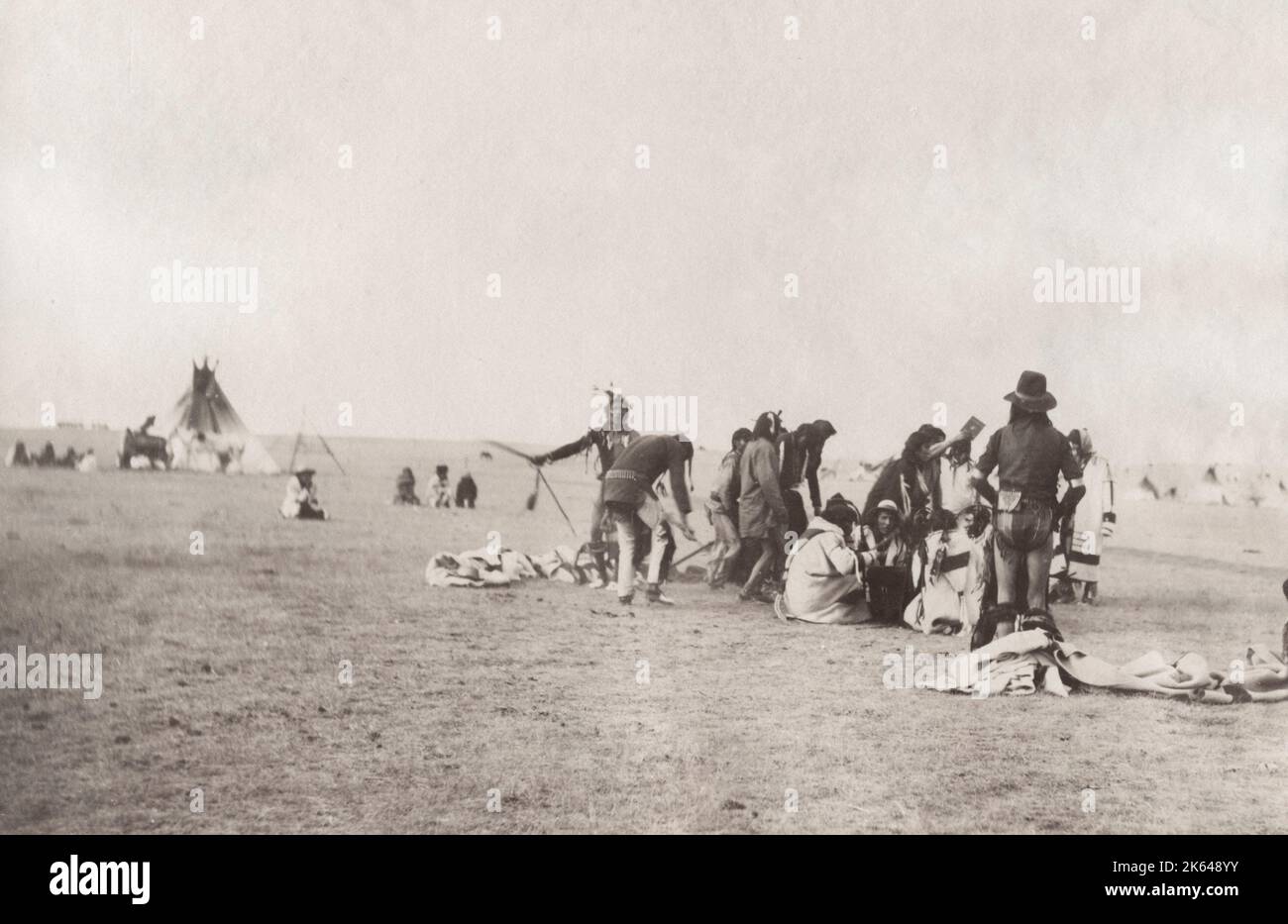 19th century vintage photograph - Native American, first nation peoples, Blackfoot Reserve, Canada, photograph William Notman, c.1880's. Caption reads: Indian Dance, Blackfoot Reserve. Stock Photo
