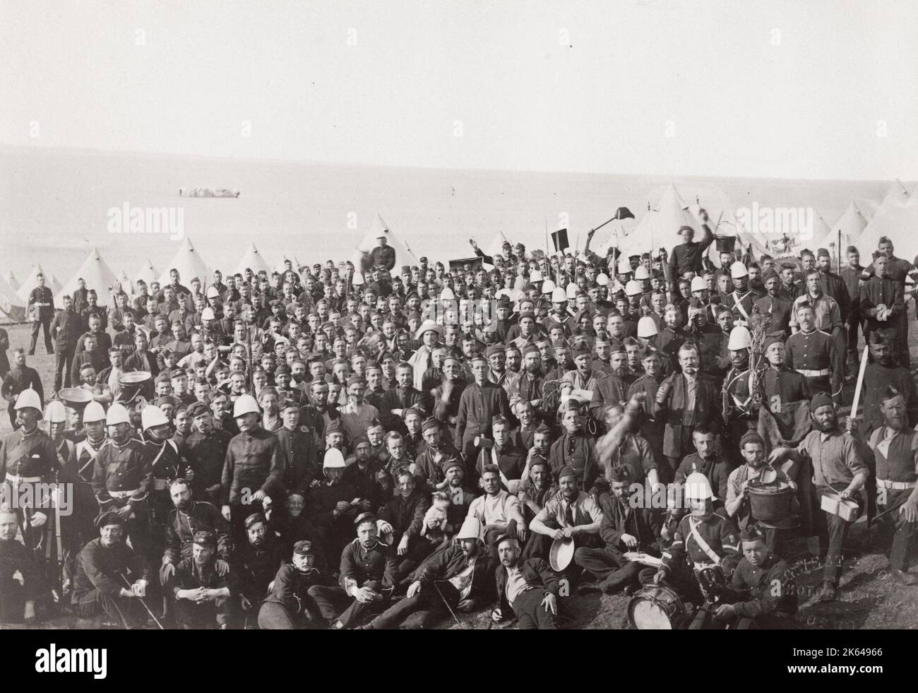 Late 19th century vintage photograph: Camp of British army soldiers, large crowd. Stock Photo